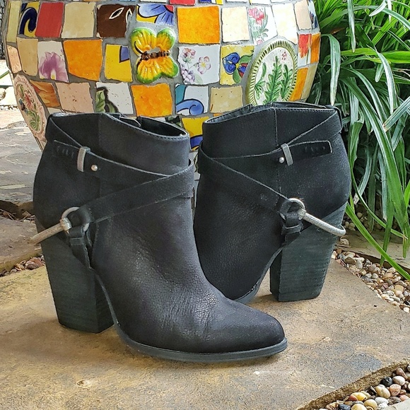 very volatile black booties